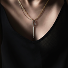 Close up of Strength Talisman Necklace on Model 