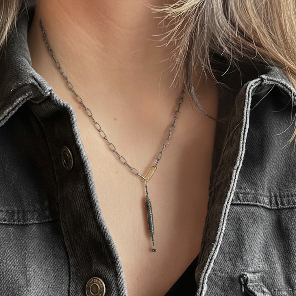 Strength Necklace with Black Diamond on a person
