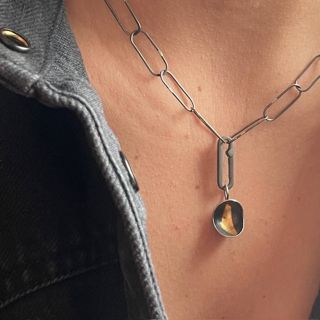 Are you a deep thinker who always analyzes the world? Looking for the most accurate answer? You prefer to watch the world from the comfort of your home instead of out in the noisy world. Solace comforts you. The Truth Seeker Necklace is for you!  This necklaces highlights our truth talisman pendant. 