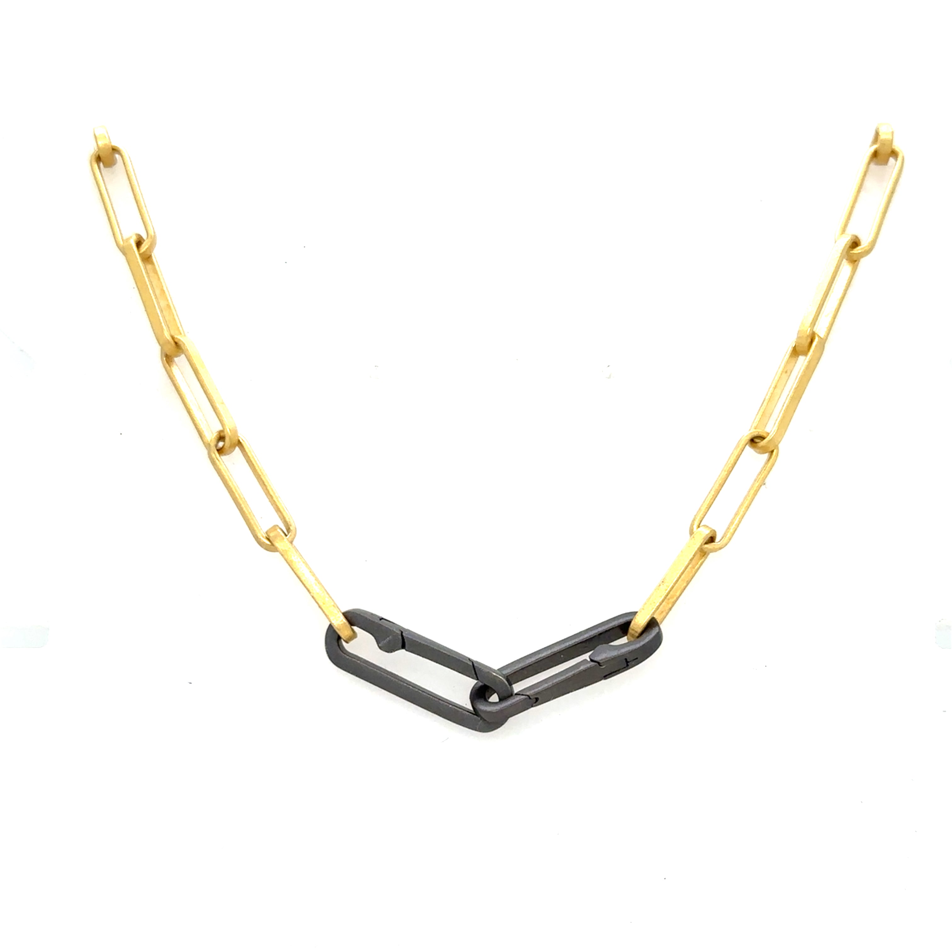 A statement piece that exudes luxury and confidence. This substantial chain features oversized, interlocking links crafted from high-quality gold plate, creating a bold and eye-catching silhouette. Versatile, it can be worn alone as a striking statement necklace or paired with talismans and pendants for a more personalized look. 