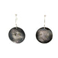 Adorn yourself with a piece of Whidbey Island's ever-changing sky with our Sunbreak Earrings. These stunning oxidized silver discs capture the elusive dance of clouds and sunlight that paints the island's heavens in an ever-shifting tableau.

Each earring is a canvas of deep, oxidized silver, reminiscent of the moody gray clouds that often blanket Whidbey's skies and it's the perfect backdrop for the touches of gleaming gold that adorn the surface. 