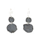 Experience the raw beauty of Whidbey Island's twilight hours with our Twilight Drop Earrings. They feature two oxidized discs with uniquely molten edges, evoking the island's rugged shorelines as day melts into night.