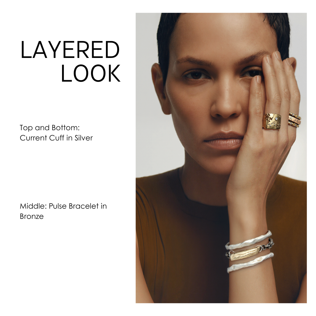 Woman wearing layered jewelry with text indicating types of jewelry.