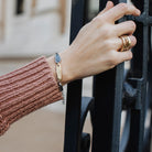 Mixed Metal Bracelet and Alchemist Stacking Rings in Bronze on model