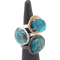 The semi precious gemstones in our collection are carefully chosen for their unique color and energy. This ring features Turquoise. Turquoise is the stone of wisdom & tranquility.
