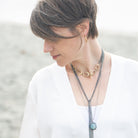 Bronze Small Hoop Earrings on Model with Necklaces