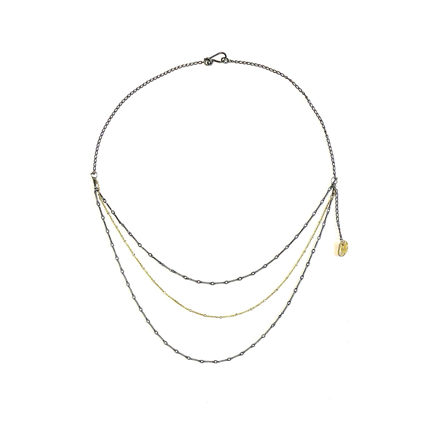 A delicate and stunning necklace! Get the look of layers in one simple beauty. 