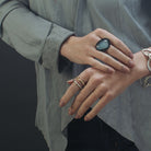 Odyssey Rings in Silver and Bronze featured on Model 