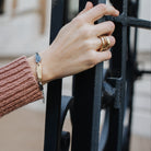 Model wearing the Alchemist Stacking Rings in Bronze 