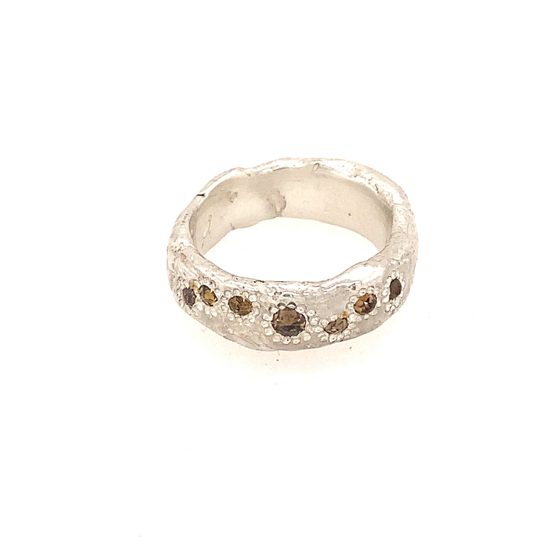 Designed with the essence of wabi-sabi, each ring is handcrafted using only the finest metals and cognac diamonds. It's the perfect ring to mark a special occasion or celebrate a personal milestone. So why wait?  Go ahead and make a statement and thrive in every aspect of your life!