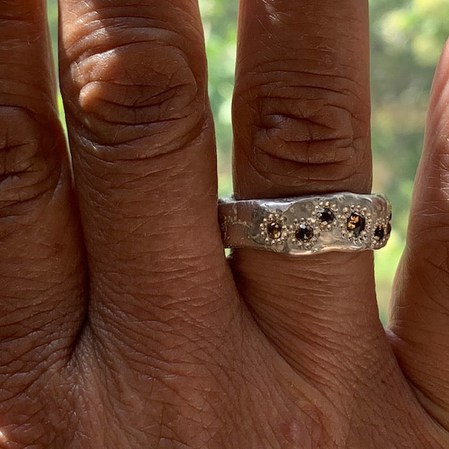 Designed with the essence of wabi-sabi, each ring is handcrafted using only the finest metals and cognac diamonds. It's the perfect ring to mark a special occasion or celebrate a personal milestone. So why wait? Go ahead and make a statement and thrive in every aspect of your life!